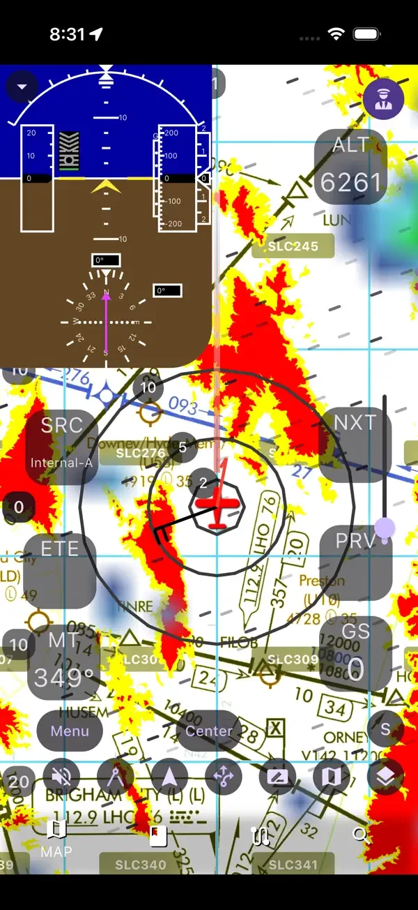 AvareX navigation map with weather overlay, flight instruments and moving-map controls.