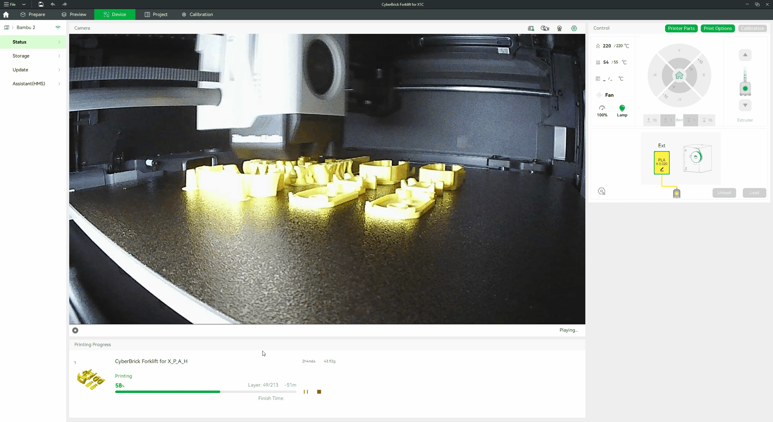Bambu Studio: Device workspace showing the printer camera feed and a yellow-part print at 58 percent
