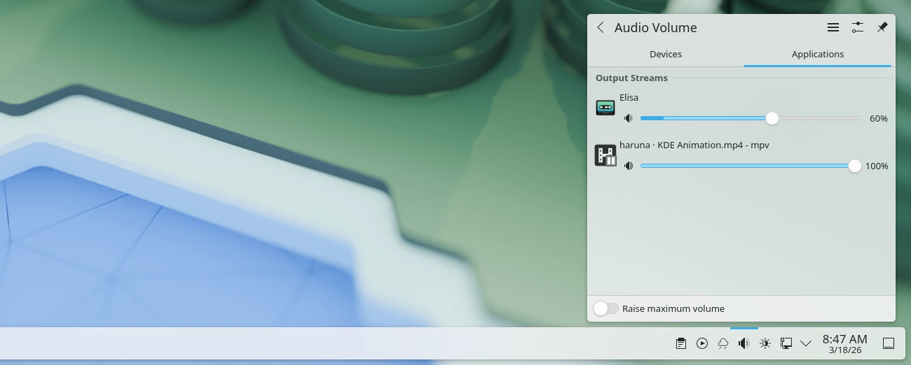 KDE Plasma system tray audio volume popup with device and application sliders