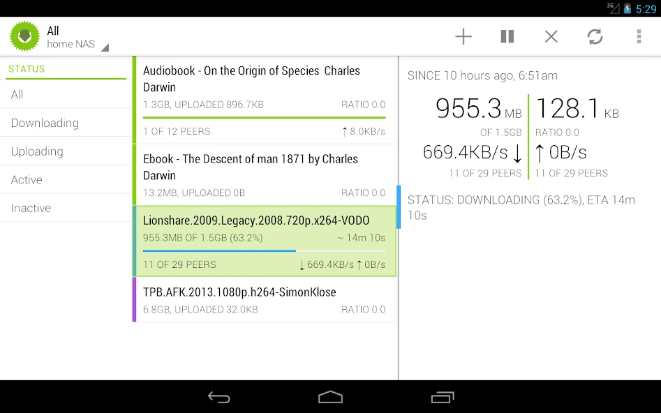 Tablet layout with a status filter list, torrent list and transfer statistics panel in the light theme