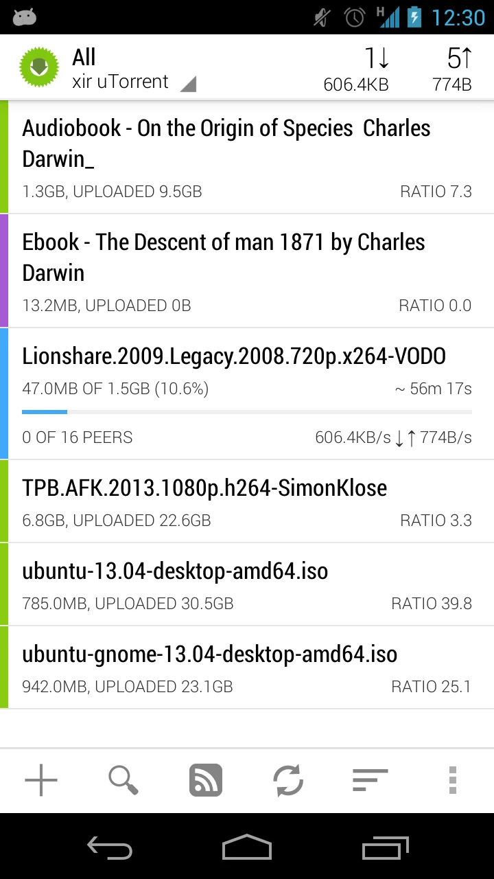 Torrent list on a phone with progress, ratio and a bottom toolbar